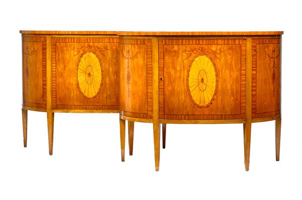 A pair of 18th century Adams Revival marquetry inlaid satinwood side cabinets, each with radial veneered top over single drawer, on tapering square su