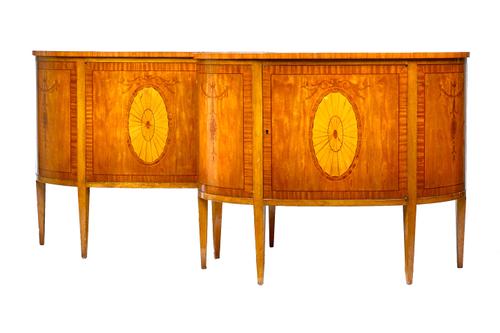 A pair of 18th century Adams Revival marquetry inlaid satinwood side cabinets, each with radial veneered top over single drawer, on tapering square su