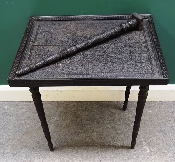 A late 19th century Eastern extensively carved hardwood tray top occasional table, 61cm wide, and a set of brass bound oak folding steps, (2).