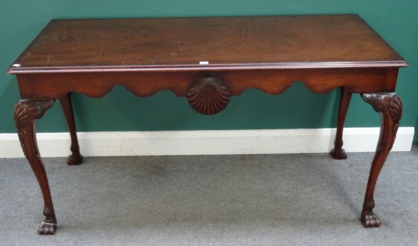 A George I style mahogany serving table, the rectangular top on shell capped cabriole supports and hairy paw feet, 152cm wide x 68cm deep x 78cm high,