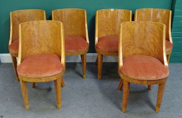 A set of six Art Deco figured walnut tub back dining chairs on tapering square supports, 50cm wide x 83cm high, (6).