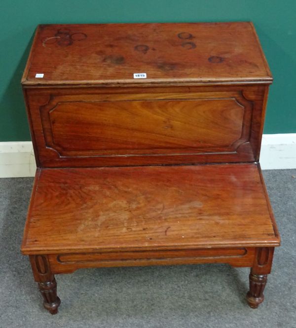 A set of early 19th century Anglo-Indian teak two tread bed steps, on tapering reeded supports, 64cm wide x 58cm high x 62cm deep.