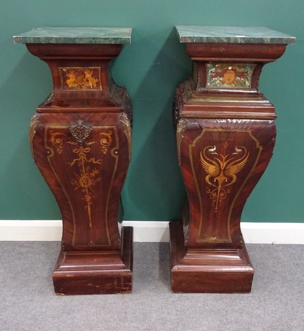 A near pair of Art Nouveau design inlaid mahogany pedestals of square baluster form, 43cm wide x 129cm high, (2).