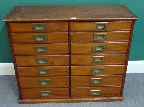 A Victorian mahogany bank of two rows of seven graduated drawers on plinth base, 93cm wide x 77cm high x 34cm deep.