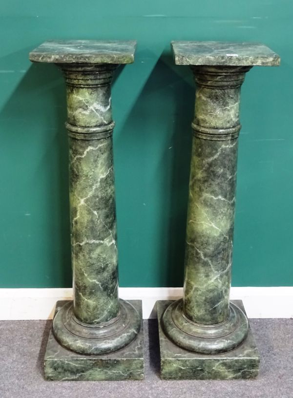 A pair of faux marble painted jardiniere stands on turned columns with square end capitals, 34cm wide x 116cm high, (2).