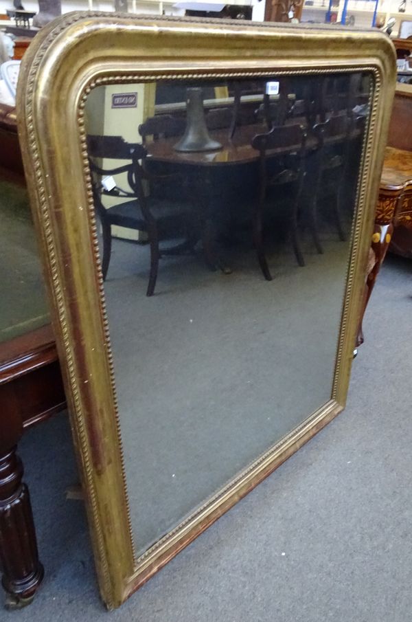 A Victorian gilt framed arch top overmantel mirror, with moulded frame, 112cm wide x 128cm high.