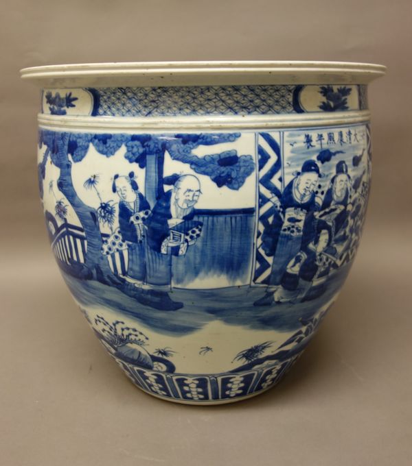 A Chinese blue and white jardiniere,  20th century, painted with scholars in a landscape, 36.5cm. high.