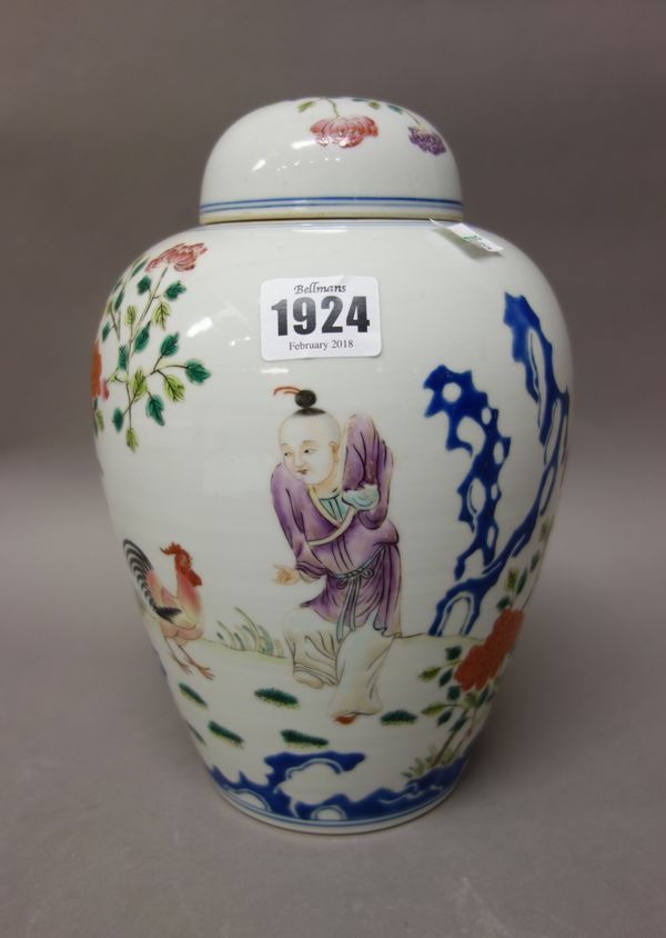 A Chinese famille-rose ovoid vase and cover, 20th century, painted with a boy with a cockerel amongst flowers, the reverse with calligraphy, apochryph