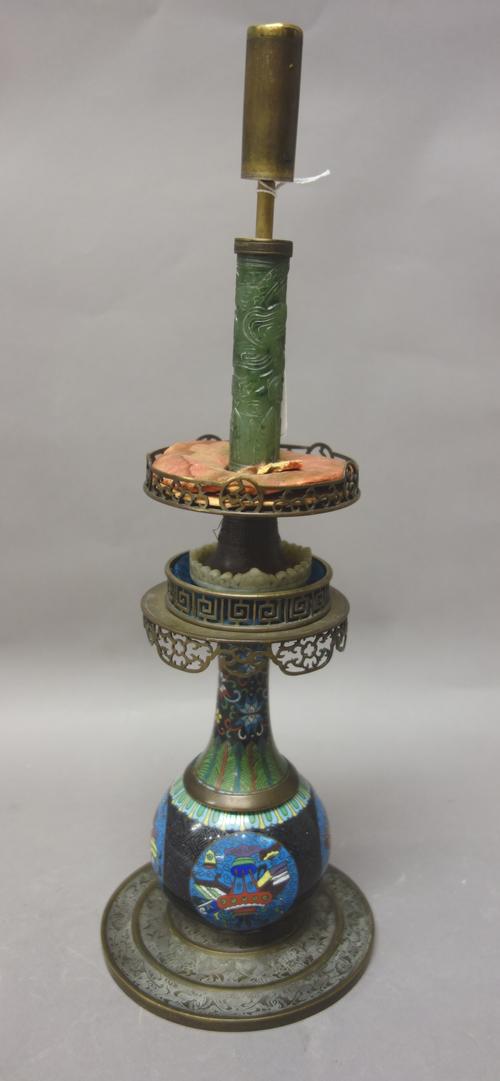 A Chinese cloisonné vase adapted as a lamp, late 19th/20th century, the vase of bottle form worked with panels of Buddhist emblems on a black ground,