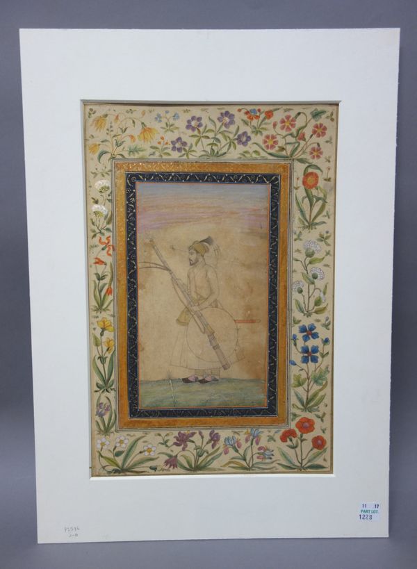 An album page with a portrait of a mughal prince, Delhi, North India, circa 1800, pencil and transparent pigments on paper, the prince standing holdi