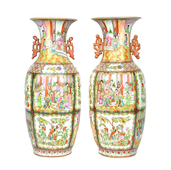 A pair of Cantonese famille- rose two-handled baluster vases, 19th century, the body painted with figurative panels alternating with panels of birds i