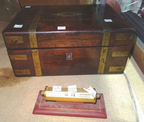 A George IV rosewood and brass mounted jewellery box and a desk calendar, (2).  S1