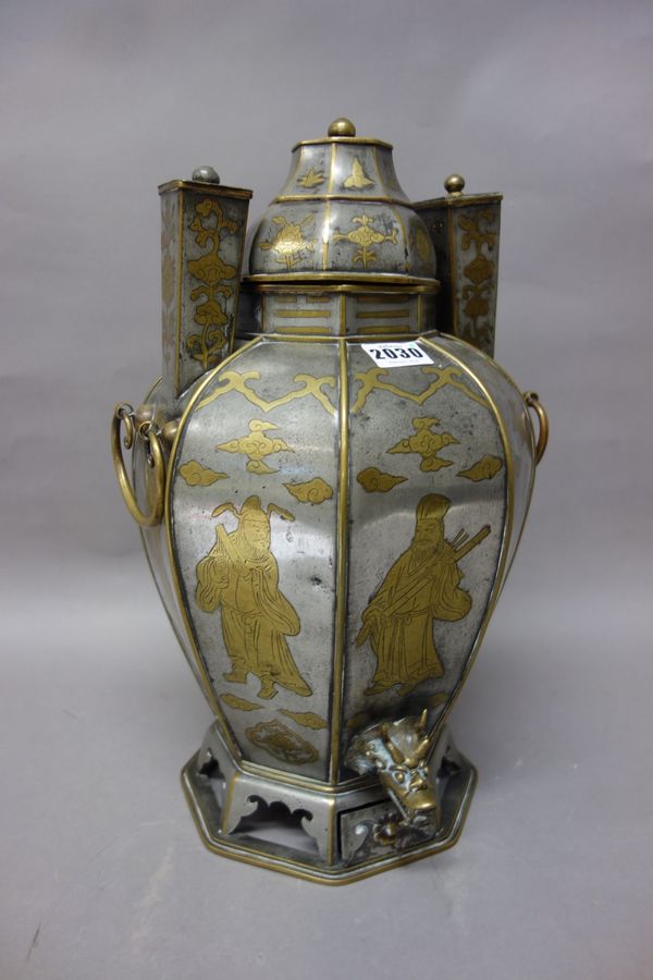 A Chinese pewter and bronze inlaid samovar, 19th century, of octagonal form, each side inlaid with an Immortal amongst cloud scrolls, the neck inlaid