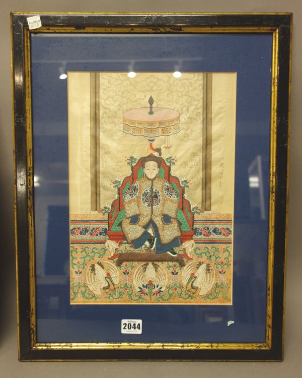 A pair of Chinese ancestral portraits on silk, 19th century,  framed and glazed, 34cm. by 24cm. (2)  Illustrated