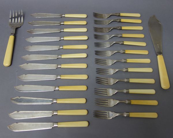 Twelve silver bladed fish knives, with ivory handles and twelve silver fish forks, with ivory handles, Birmingham 1930 and 1931 and a pair of silver f