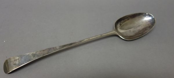 A George III silver basting spoon, Hanoverian pattern, crest engraved, bottom marked, London 1771, length 35cm, weight 159 gms.    Add 1  Illustrated