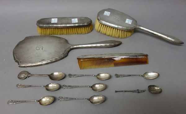 Silver and silver mounted wares, comprising; a four piece dressing set, consisting of a hand mirror, a hairbrush, a clothes brush and a comb, London 1