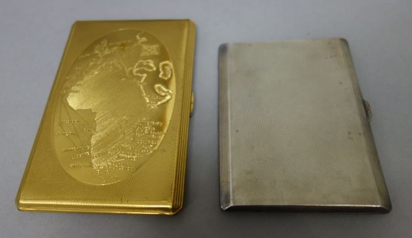 A silver rectangular cigarette case, gilt within and presentation inscribed, the exterior with engine turned decoration, Birmingham 1934, gross weight