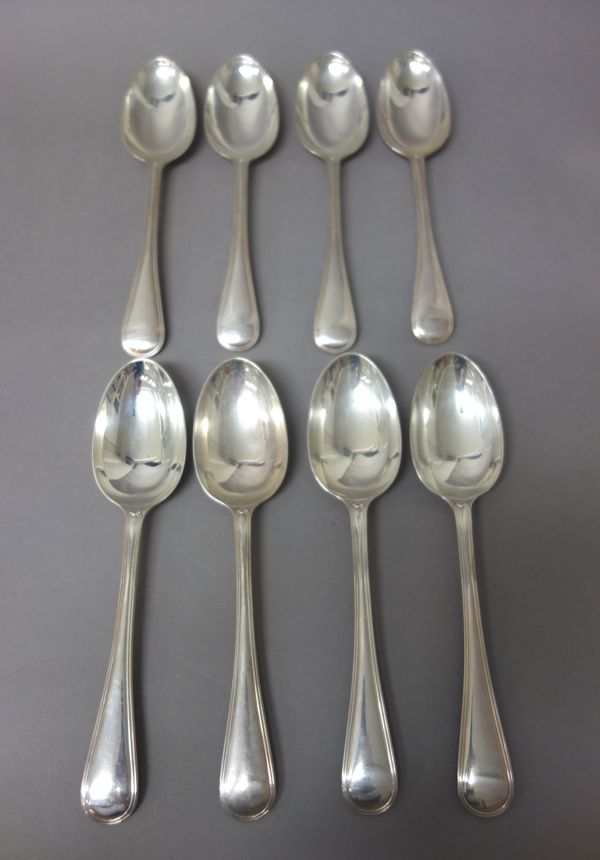 Eight silver double struck Old English and thread pattern large dessert spoons, London 1913, combined weight 628 gms, (8).