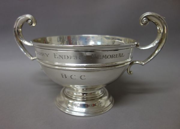 A silver twin handled trophy bowl, raised on a circular foot, presentation inscribed, probably Sheffield 1901, weight 448 gms.