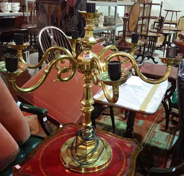 A 20th century large brass seven branch table candelabra, fitted for electricity.  E5