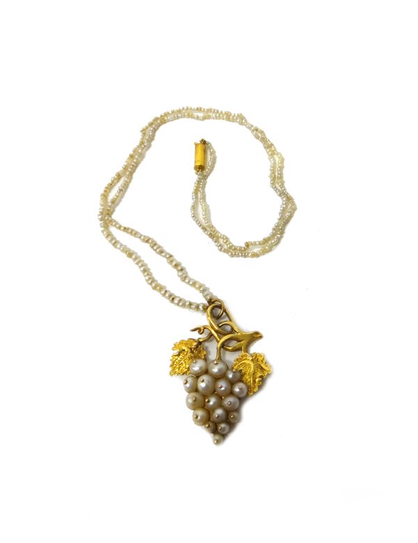 A gold and cultured pearl pendant necklace, designed as a bunch of grapes, fitted to a single row necklace of slightly graduated seed pearls, on a cyl