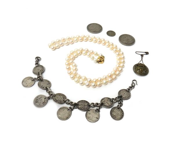 A single row necklace of uniform cultured pearls, on a 9ct gold clasp, a bracelet made from silver threepences, a pendant detailed 'Newfoundland' and