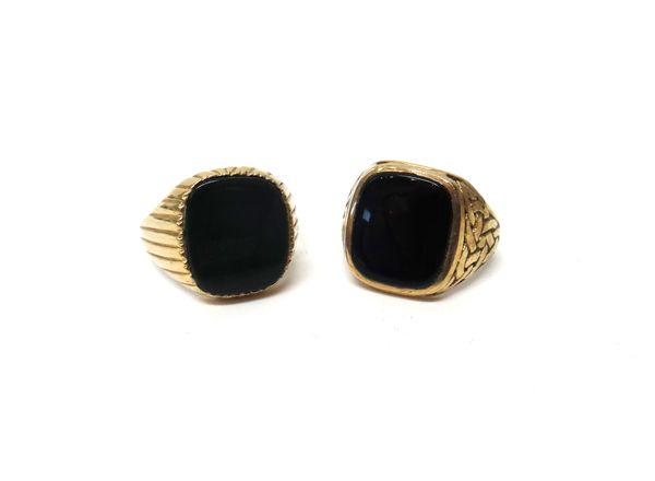 A 9ct gold and bloodstone set signet ring, with ridged decoration, ring size larger than Z and a 9ct gold and black onyx signet ring, with Celtic styl