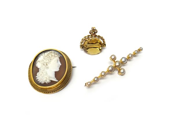 A Victorian gold mounted oval shell cameo brooch, carved as a Classical portrait, a gold and half pearl set brooch and a 9ct gold mounted citrine set