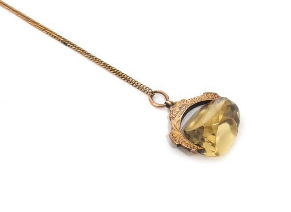 A 9ct gold mounted citrine triple sided rotating pendant fob, with engraved decoration, Birmingham 1906, (2).