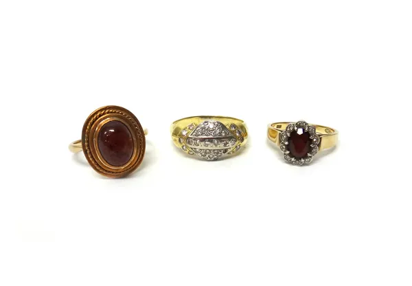 A gold and diamond set ring, mounted with circular cut diamonds (one diamond lacking), a carbuncle garnet set single stone ring and a gold, garnet and