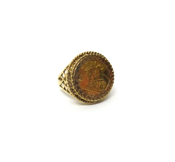 A 9ct gold ring, mounted with an Elizabeth II half sovereign 1982, ring size Y and a half, weight 10.8 gms.