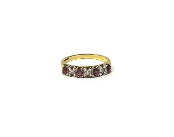 An 18ct gold, ruby and diamond set seven stone half hoop ring, mounted with alternating circular cut rubies and diamonds, ring size Y.