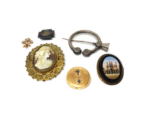 An oval mosaic brooch, designed as a classical building, a gold circular brooch, the front with a seed pearl set flower spray motif (detached, but pre