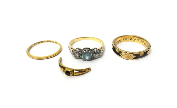 A gold ring, claw set with a circular cut blue zircon, between two circular cut diamonds, detailed 18ct, a Victorian 9ct gold mourning ring, (the hair
