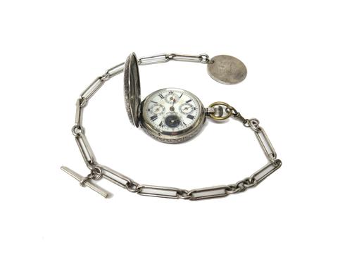 A gentleman's silver cased, keyless wind, hunting cased calendar pocket watch, with an unsigned jewelled movement, the inner and outer case detailed 0