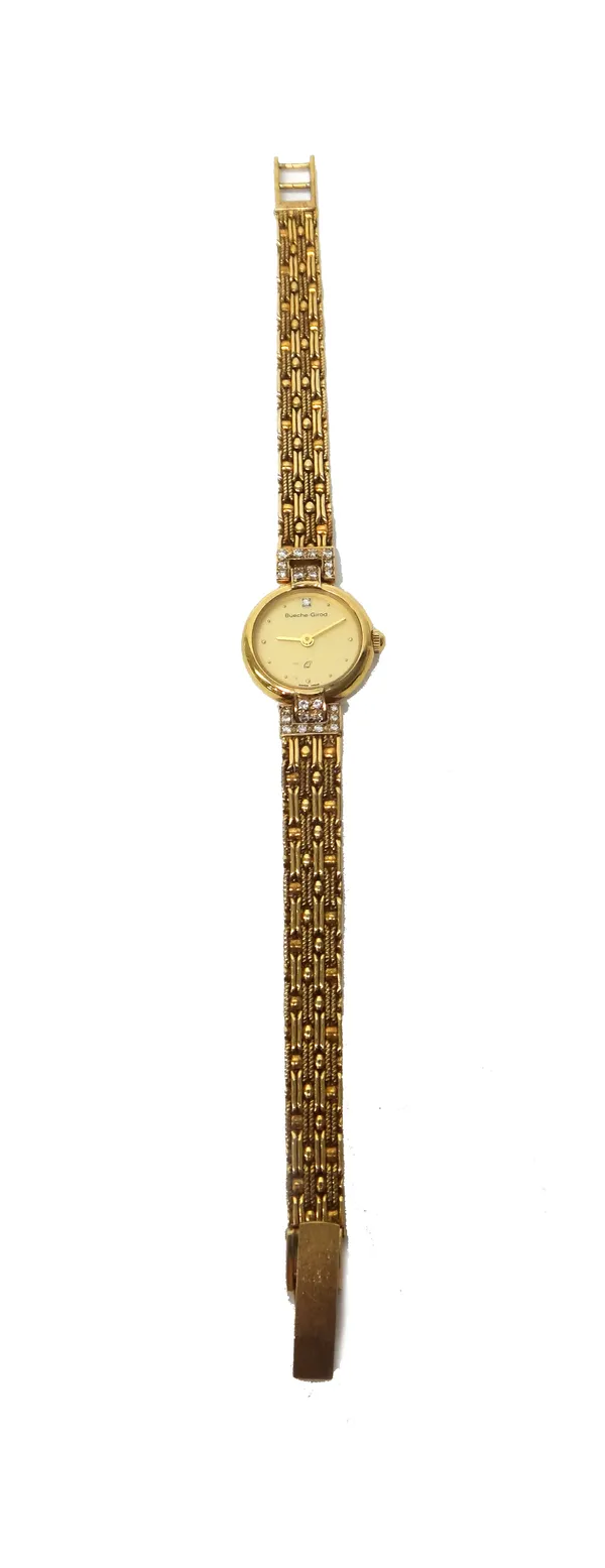 A Bueche-Girod 9ct gold and diamond set lady's bracelet wristwatch, with a quartz movement, the signed circular gilt dial mounted with a diamond at 12