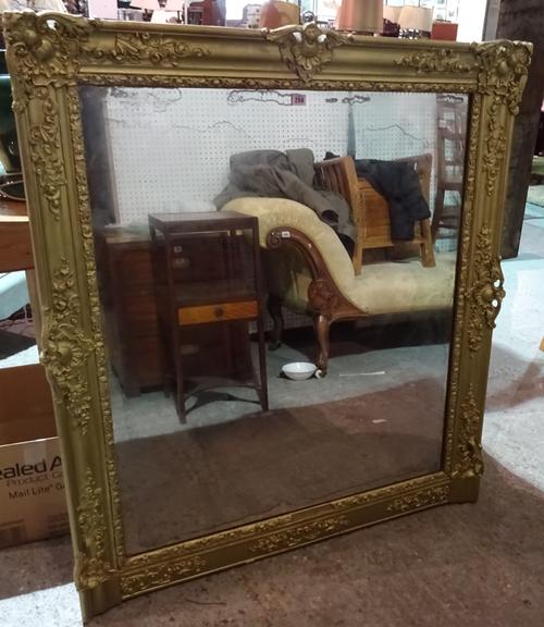 An early 20th century gilt framed rectangular mirror, 112cm wide x 126cm high.