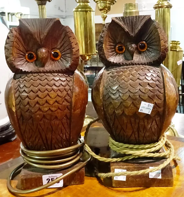 A pair of mid-20th century carved oak table lamps formed as stylized owls, (2).  G6