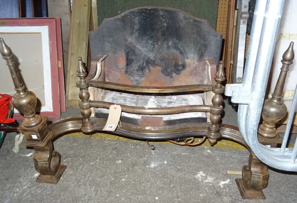 A 20th century iron and steel fire place on scroll supports, 89cm wide x 60cm high.  D