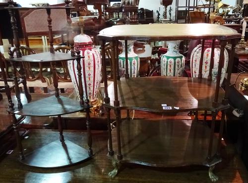 A Regency design three tier what-not of serpentine outline, on brass paw feet, 52cm wide, together with a mahogany bowfront hanging three tier shelf,