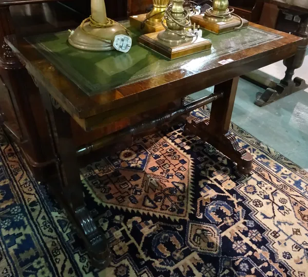 A late William IV rosewood rectangular centre table, on trestle end standards, 91cm wide.  1110  F6