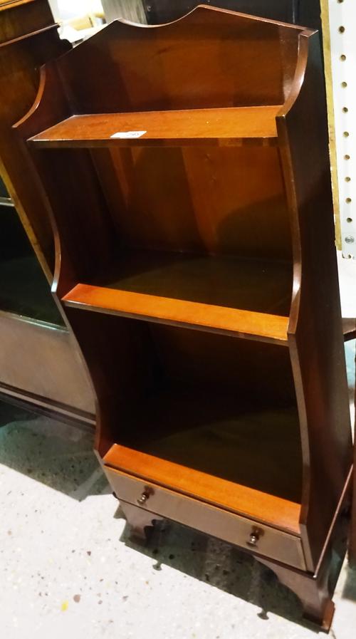 A Regency style mahogany three tier waterfall bookcase, with single drawer base, 44cm wide x 102cm high.  1102  G6