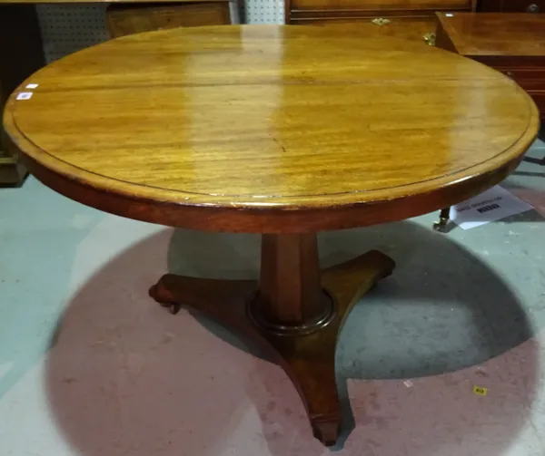 A George III mahogany breakfast table with octagonal turned column on bun feet, 101cm wide x 65cm high.  B8