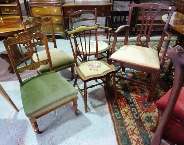 A pair of Edwardian walnut nursing chairs on ring turned supports, a George III mahogany open armchair, a child's stickback chair and another.   C9/B