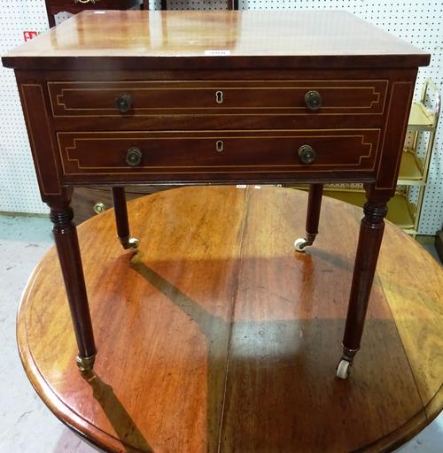 An early 19th century mahogany lady's writing table with two short drawers on ring turned supports, 53cm wide x 58cm high, (cut down).   B8