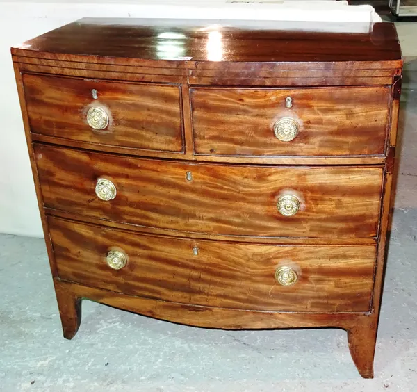 An early 19th century mahogany bowfront chest of drawers, two short and two long drawers, 88cm wide x 90cm high.  A8