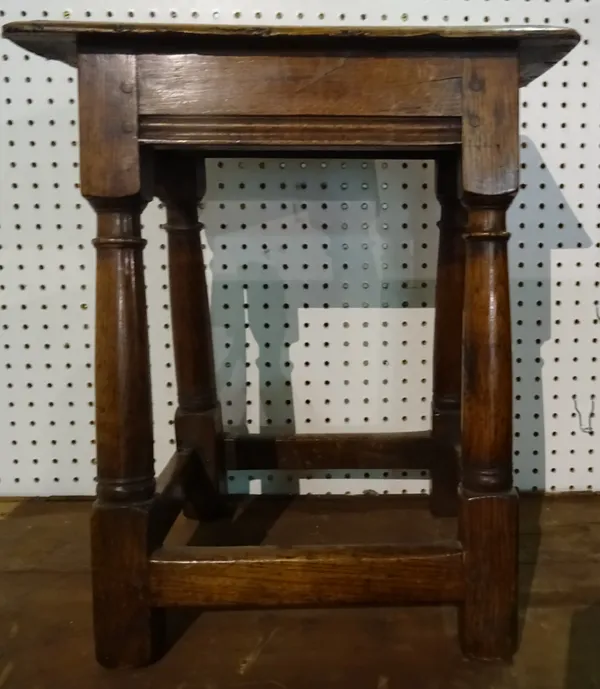 An 18th style century oak joint stool with rectangular top and perimeter stretcher, 45cm wide.   M8