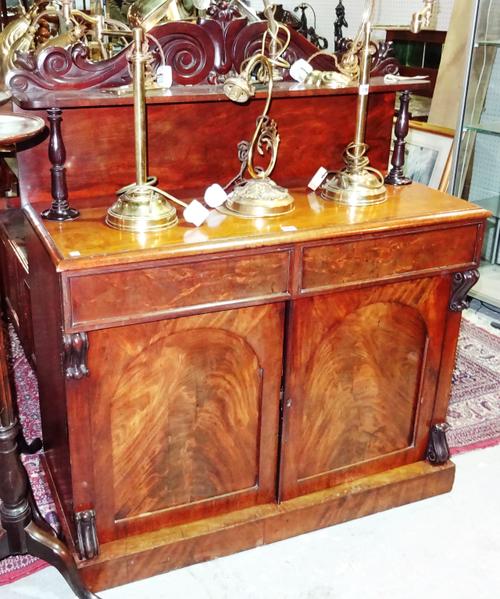A Victorian mahogany chiffonier with carved top rail and scroll decoration, 111cm wide x 132cm high.  G8