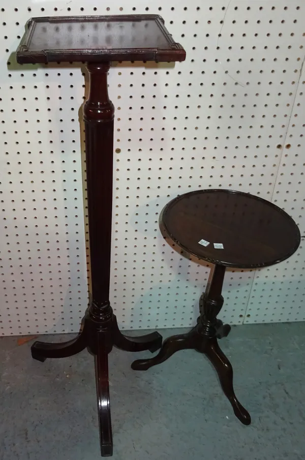 A George II style mahogany circular tripod table and a Regency style mahogany jardiniere stand, on downswept supports, 24cm wide x 90cm high, (2).  C5